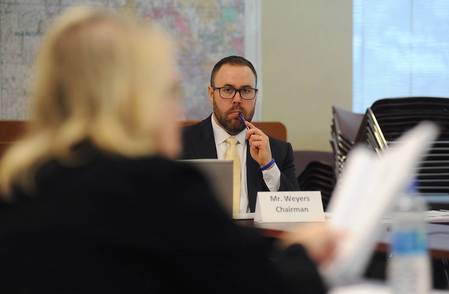 McHenry County electoral board Chairman Sam Weyers listens to attorney Keri-Lyn Krafthefer as she argues a point during a hearing Thursday, April 14, 2022, at the McHenry County Administration Building in Woodstock. The board was to determine if Tony Colatorti can remain on the ballot following an objection by William Brogan and Joel Brumlik over his qualifications to run for the position of McHenry County sheriff.