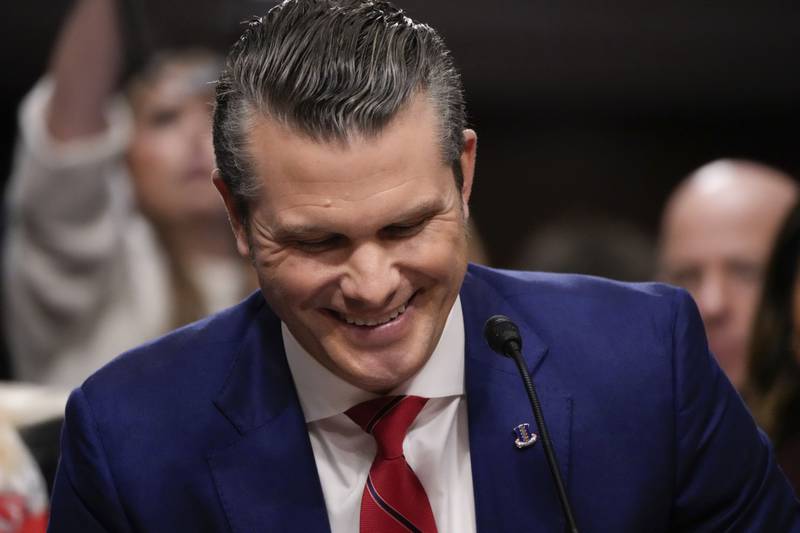 Pete Hegseth, President-elect Donald Trump's choice to be Defense secretary, appears before the Senate Armed Services Committee for his confirmation hearing, at the Capitol in Washington, Tuesday, Jan. 14, 2025. (AP Photo/Alex Brandon)