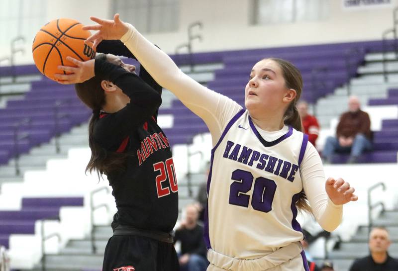 Huntley’s Alyssa Borzych, left, shoots as Hampshire’s Sadie Van Horn defends in varsity girls basketball on Wednesday, Feb. 11, 2026, at Hampshire High School in Hampshire.