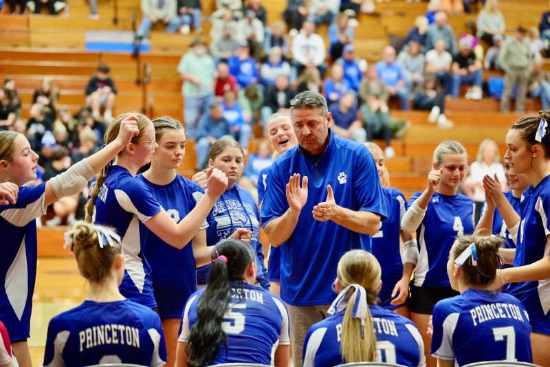 Princeton coach Andy Puck works the huddle during Tuesday's regional semifinal match at Princeton. The Tigresses won 2-0 to advance to Thursday's finals against Newman.