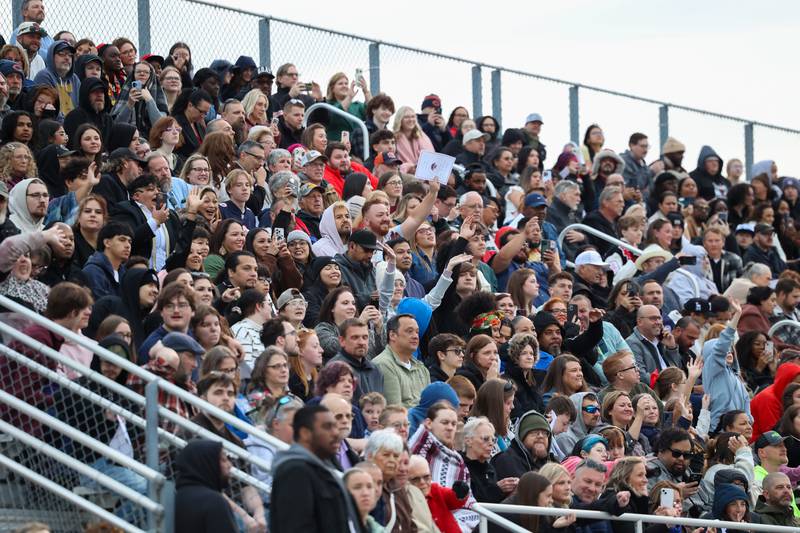 Families wave to their graduates from the stands during the Bradley-Bourbonnais Community High School commencement ceremony on Thursday, May 21, 2026.