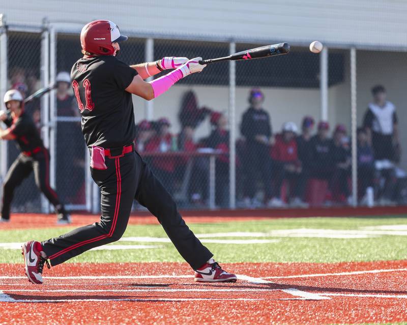 Yorkville's Bodhi Harrison (11) pulls a pitch to third during baseball game between Oswego at Yorkville. Thursday, May 8, 2025 in Yorkville.