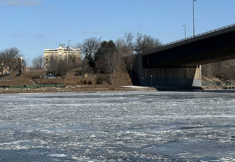 The Illinois River is frozen solid underneath the Illinois Route 23 Veterans Memorial Bridge on Tuesday, Jan. 21, 2025 in Ottawa.