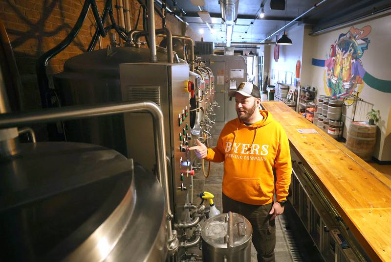 Steve Byers, co-owner of Byers Brewing Company, talks about the brewing process Friday, Jan. 6, 2023, in the production area at the brewery and taproom in DeKalb. Byers is planning an expansion of its operations to include another location  216 N. Sixth St. in DeKalb for production only.