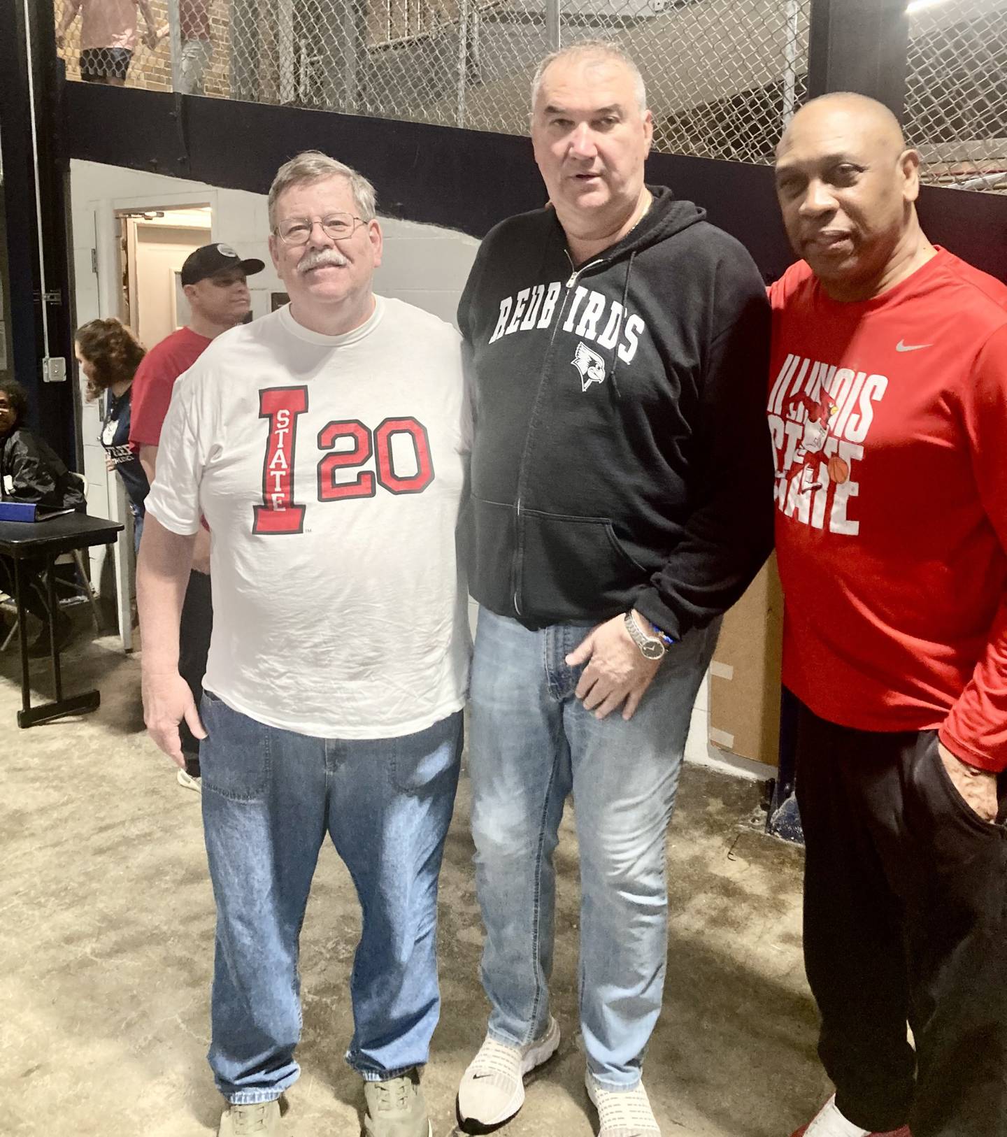Three old ISU Redbirds met at up Hinkle Fieldhouse for the NIT semifinals when BCR Sports Editor Kevin Hieronymus (from left) met up with former ISU players Lou Stefanovic and Rickie Johnson that he covered for the student newspaper.