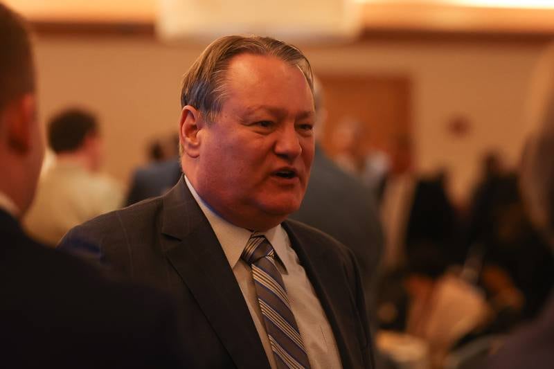 Joliet City Manager James Capparelli talks to guest after the Mayor of Joliet’s annual State of the City address at Harrah’s. Wednesday, Mar. 9, 2022, in Joliet.