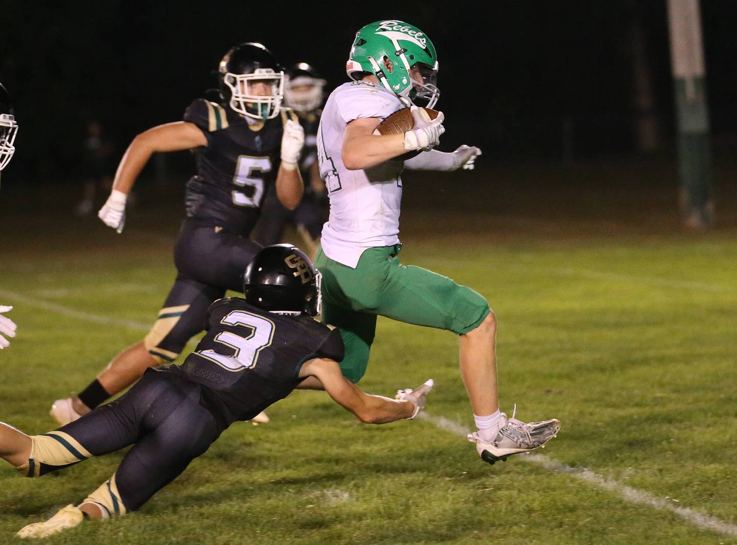 Ridgewood's Niall Kenny runs into the endzone as he is chased down by St. Bede's Halden Hueneburg and Hunter Savage on Friday, Sept. 15, 2023 at St. Bede Academy.