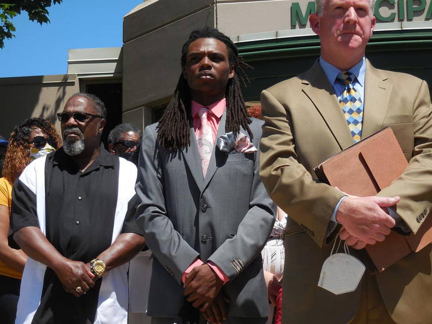 Victor Williams (center) at a press conference outside Joliet City Hall Monday. Williams was arrested after he was confronted and grabbed by Joliet Mayor Bob O'Dekirk at a Black Lives Matter demonstration May 31.