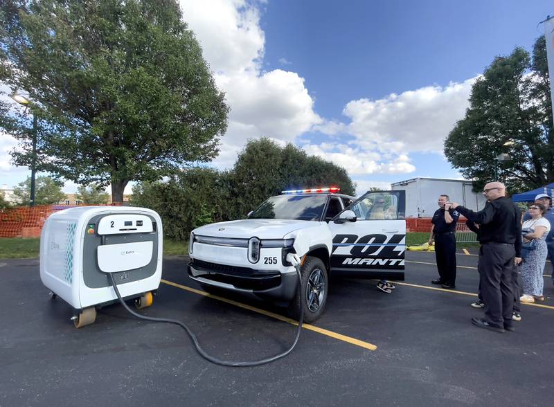 The new Manteno Police Rivian EV squad car is displayed in downtown Manteno on Thursday, Sept. 25, 2025, as Gotion, the lithium battery plant in Manteno, officially handed over the keys of the donated vehicle.