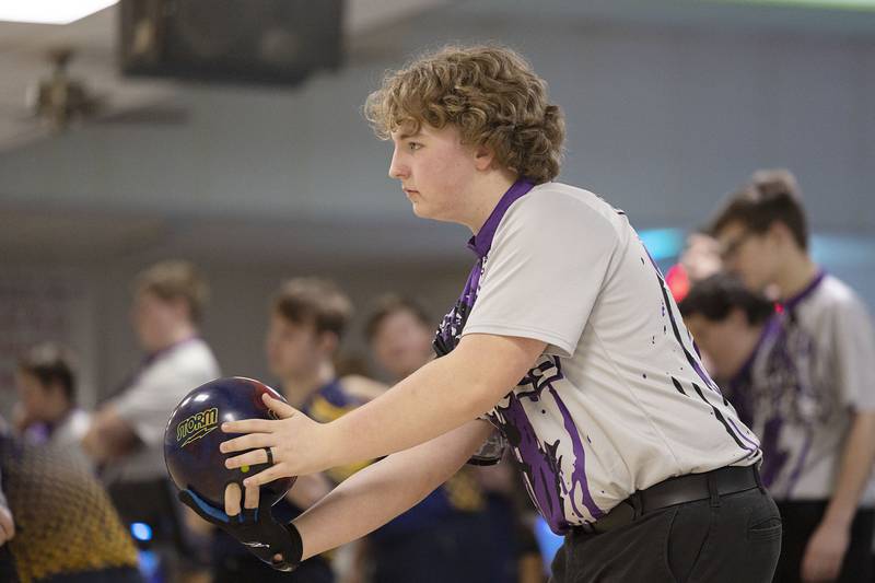 Dixon’s Cody Geil eyes the pins against Sterling, Monday, Jan. 2, 2023.