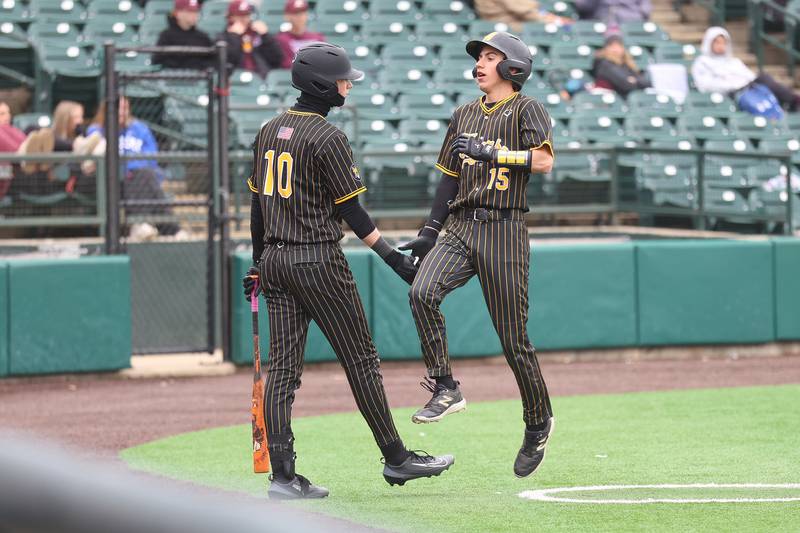Joliet West’s Bobby Malinowski score the go-ahead run on a Daneil Lukancic single against Lockport in the WJOL Don Ladas Memorial baseball tournament championship game on Saturday, April 4, 2026 in Joliet.