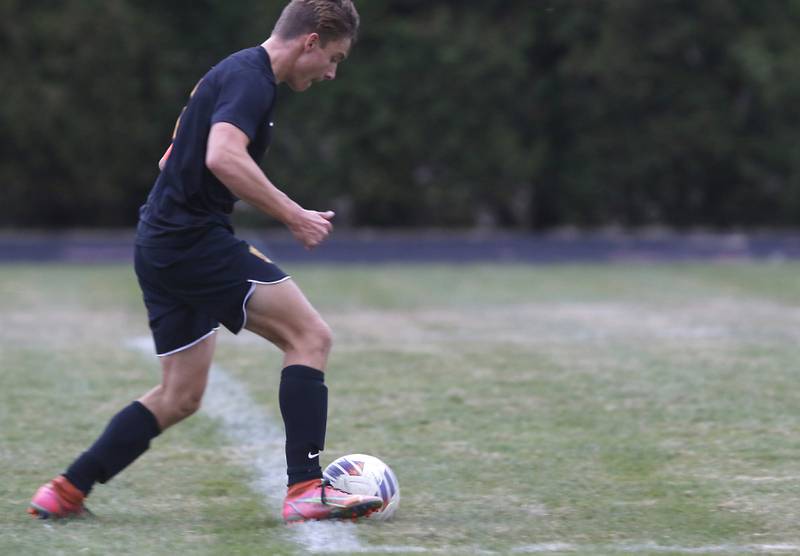 Richmond-Burton's Joseph Kyes kicks the ball into the goal during the IHSA Class 1A Marian Central Regional Boys Soccer Final  match against Marian Centralon Tuesday, Oct. 22, 2024, at Marian Central High School in Woodstock.