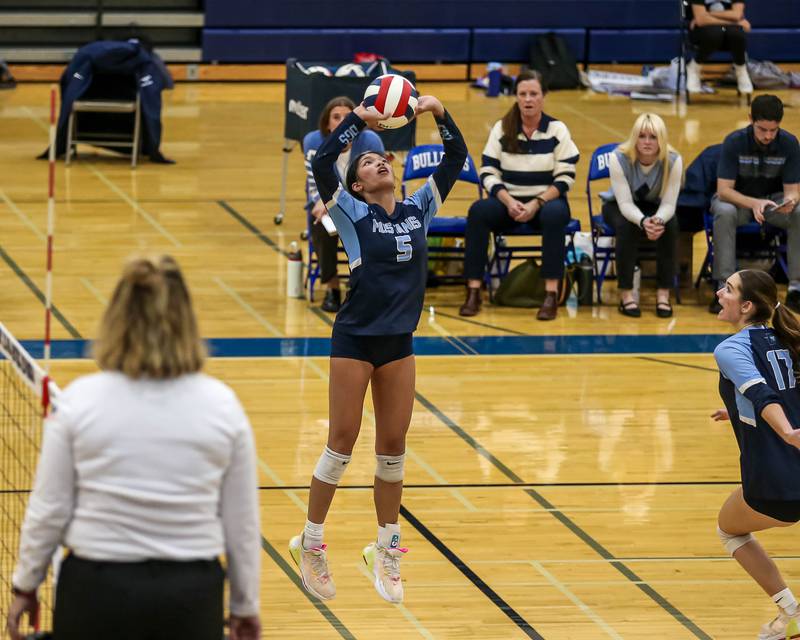Downers Grove South's Alex Barcenas (5) sets a shot during Class 4A Riverside-Brookfield Supersectional match between Lockport at Downers Grove South.  Nov 11, 2024  in Riverside.