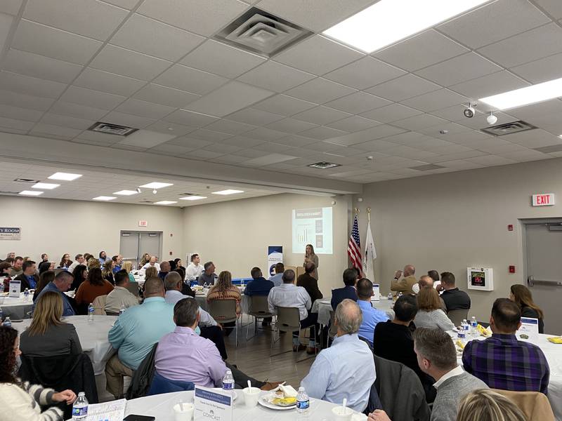 Monica Schild addresses the ground at the quarterly GEDC lunch.