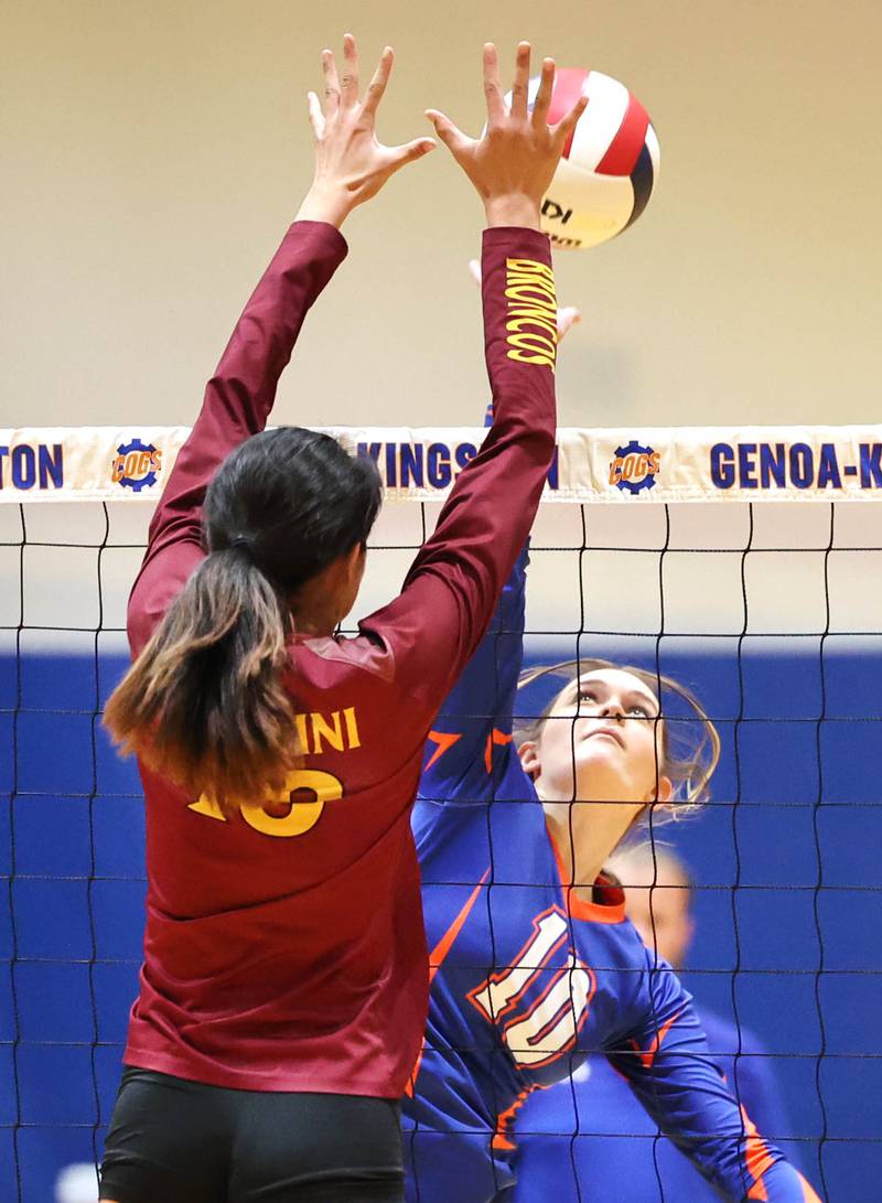 Genoa-Kingston's Rylie Stoffregen tries to spike the ball by Montini's Francesca Lorenzo during their match Tuesday, Sep. 5, 2023, at Genoa-Kingston High School.