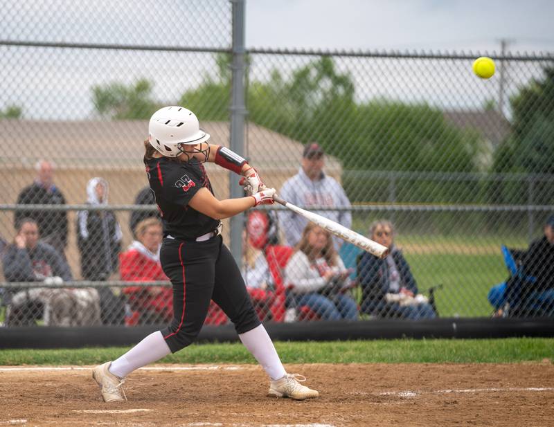 Yorkville's Lauren Koster (23) slaps single driving in a run  against Plainfield North during the Class 4A Oswego East Regional softball final at Oswego East High School on Friday, May 27, 2022.