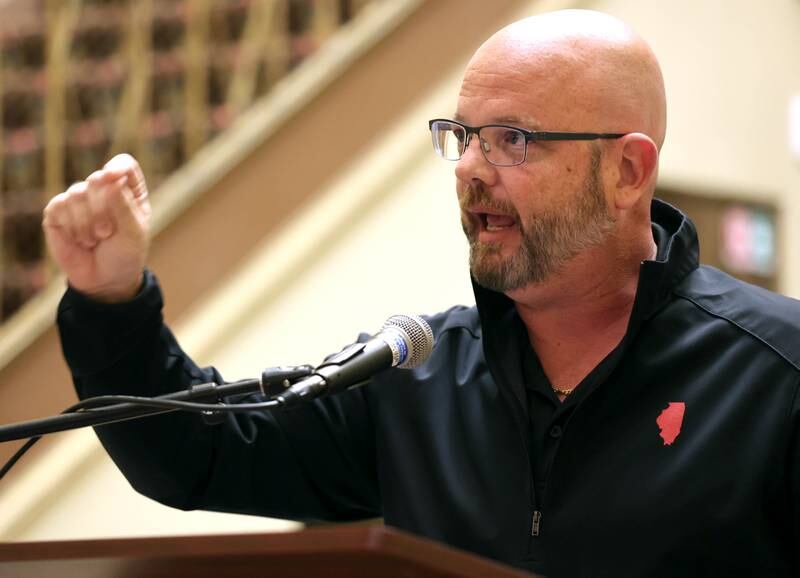 State Rep. Jeff Keicher, R-Sycamore, speaks Monday, Oct. 3, 2022, at the Egyptian Theatre during the Safe Passage domestic violence vigil.