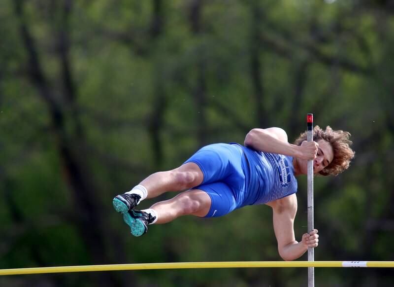 Woodstock’s Edgar Arana competes in the pole vault during Kishwaukee River Conference track meet action at Marengo Tuesday night.