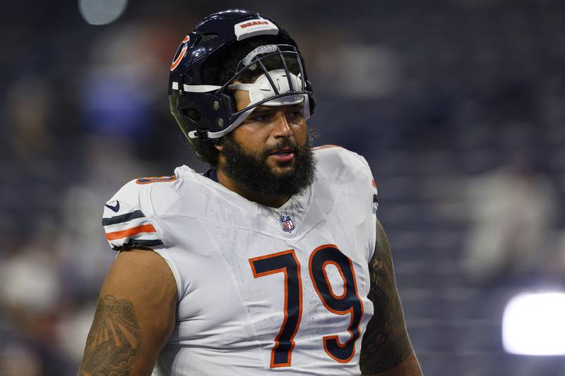 Chicago Bears offensive lineman Matt Pryor (79) warms up on the field before an NFL football game against the Indianapolis Colts, Sunday, Sept. 22, 2024, in Indianapolis. The Colts defeated the Bears 21-16. (AP Photo/Zach Bolinger)
