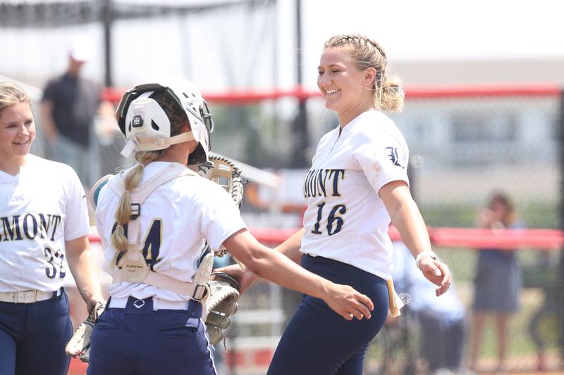 Lemont’s Sage Mardjetko, right, is greeted by Franki Rita after a strike out to end the top of the 12th inning against Antioch in the Class 3A state championship game on Saturday, June 10, 2023 in Peoria.