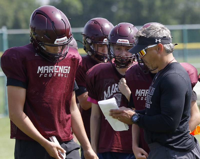 Marengo Head Coach Paul Forsythe calls a play during football practice on Tuesday, July 22,  2025, at Marengo High School.