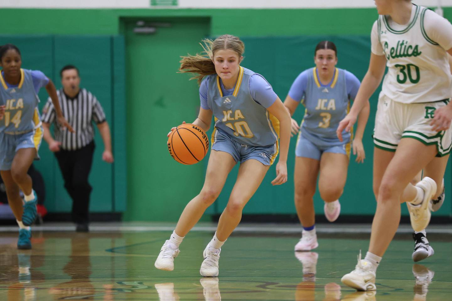 Joliet Catholic’s Emma Napier takes the ball upcourt against Providence on Saturday, Dec. 5, 2025 in New Lenox.