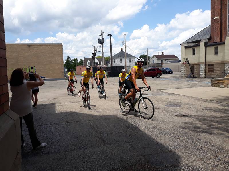 Bicyclists participating in Bikers for Babies arrives Wednesday, July 13, 2022, at the St. Columba Church rectory parking lot in Ottawa.