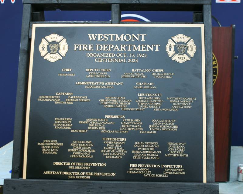 A plaque is on display on Saturday Oct. 14, 2023, during the Westmont 100 year anniversary celebration fire department open house.