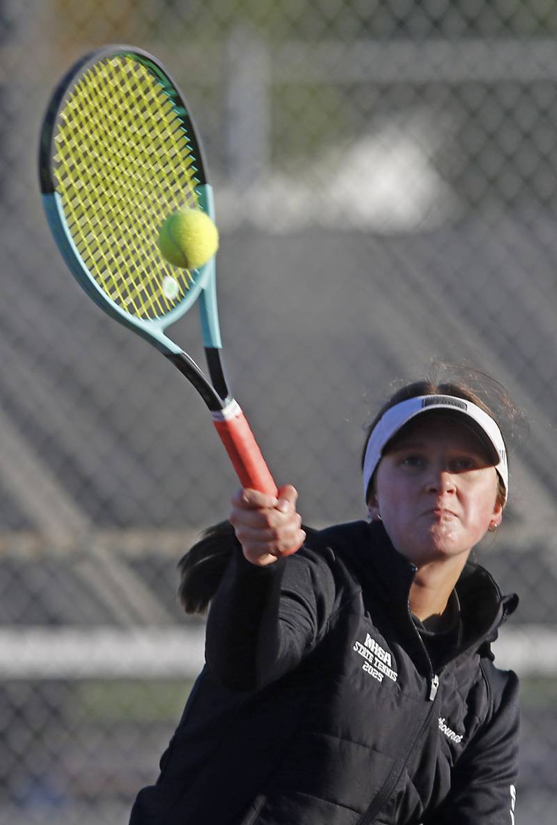 Sycamore's Maysen Pethoud returns the ball Thursday, Oct. 23, 2025, during the first day of the IHSA State Girls Tennis Tournament at Schaumburg High School.