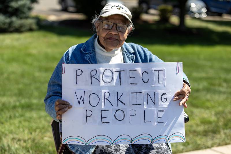 MaryAnn Pinkney holds-up a sign supporting workers during the ‘Workers Over Billionaires’ Labor Day Protest on the 1100 block of N. River Rd. in Shorewood, IL, on Sept. 1, 2025.