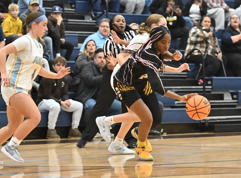 Joliet West's guard Makayla Chism (22) goes after a loose ball during the WJOL basketball tournament against Joliet Catholic on Monday, Nov 18, 2024 at Joliet. (Dean Reid for Shaw Local News)