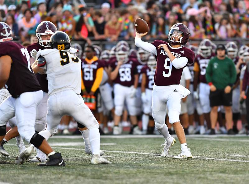 Lockport's David Marquez (9) attempting a pass down field during the non-conference game between Lockport and Joliet West on Friday, Aug. 26, 2022, at Lockport High School in Lockport.