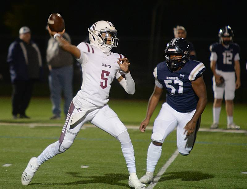 Wheaton Academy's Belay Brummel passes the ball during their game against Immaculate Conception Friday Sept 30, 2022.