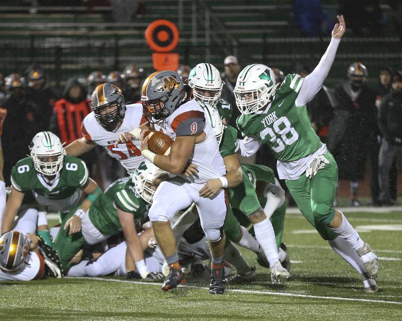 Minooka's Ivan Dahlberg (9) runs with the ball during Class 8A playoffs first-round game between Minooka at York.  Oct 29, 2021.