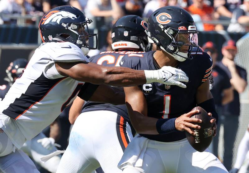 Chicago Bears quarterback Justin Fields is sacked by Denver Broncos linebacker Jonathon Cooper during their game Sunday, Oct. 1, 2023, at Soldier Field in Chicago.