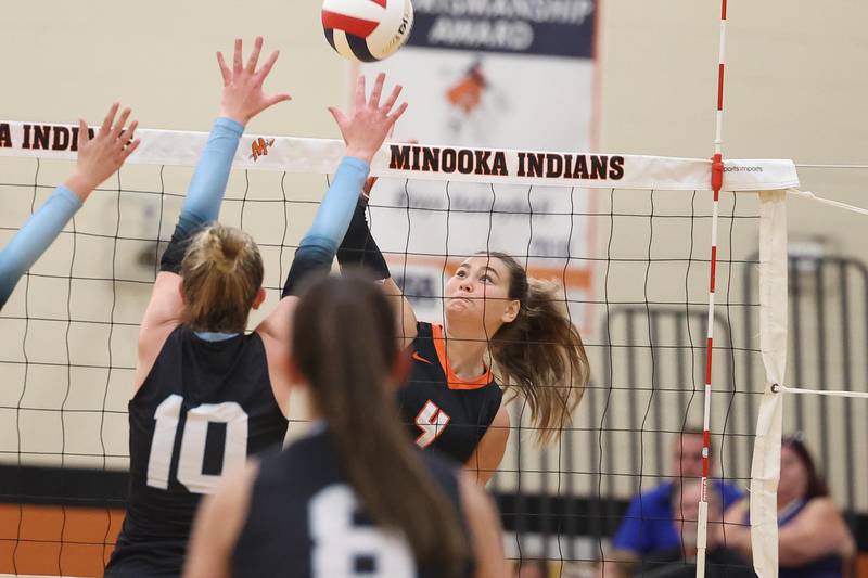 Minooka’s Jerzie Caves hits a shot against Joliet Catholic on Wednesday, Sept. 4, 2024 in Minooka.
