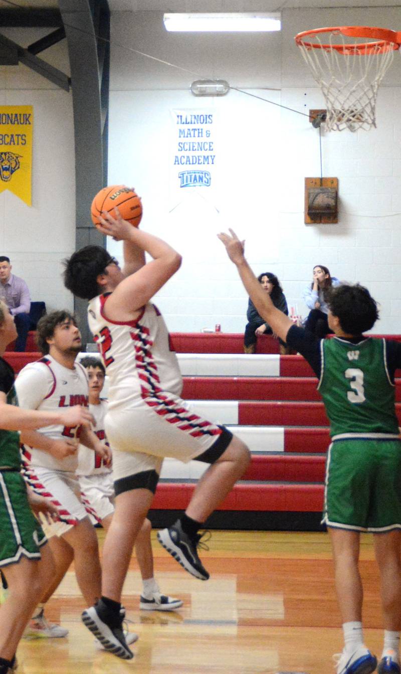 LaMoille's Colton Ladson takes in a layup against Wethersfield in Tuesday's game in the LaMoille Holiday Classic.