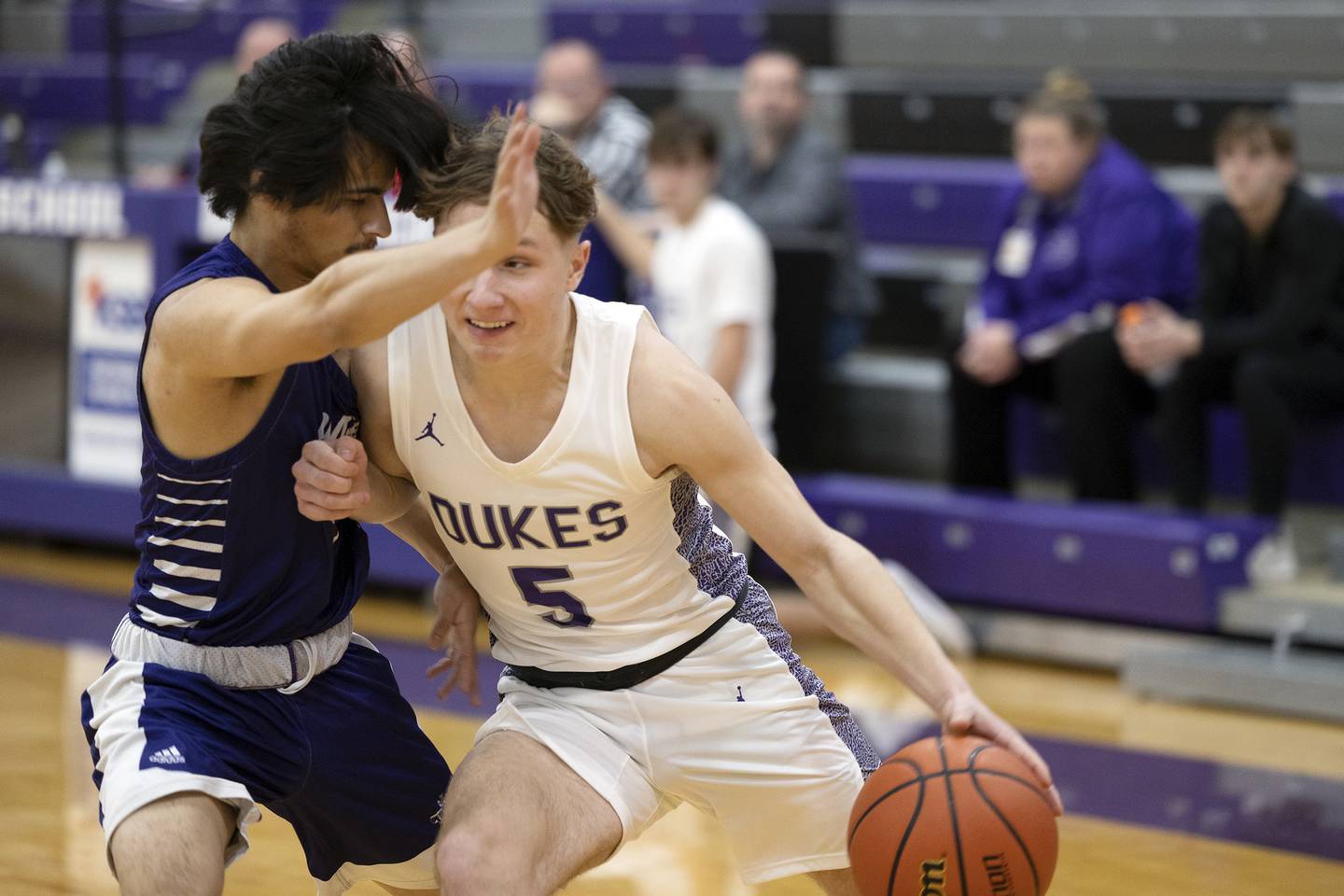 Dixon’s Grant Boss works against a Plano defender Tuesday, Dec. 13, 2022 in Dixon.