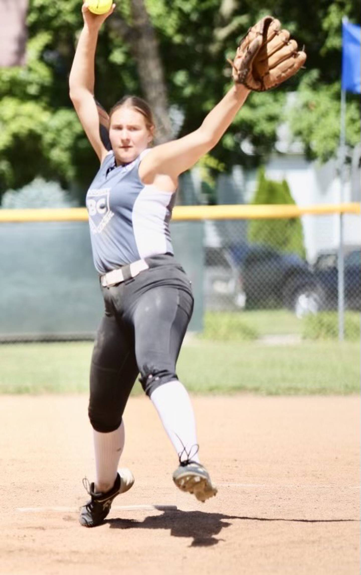 Bi-County's Myah Richardson fires a pitch in Sunday's District 20 Junior League Softball championship game at Sunset Park in Peru. Bi-County won 14-9 to advance to the state tournament this weekend in Burbank.