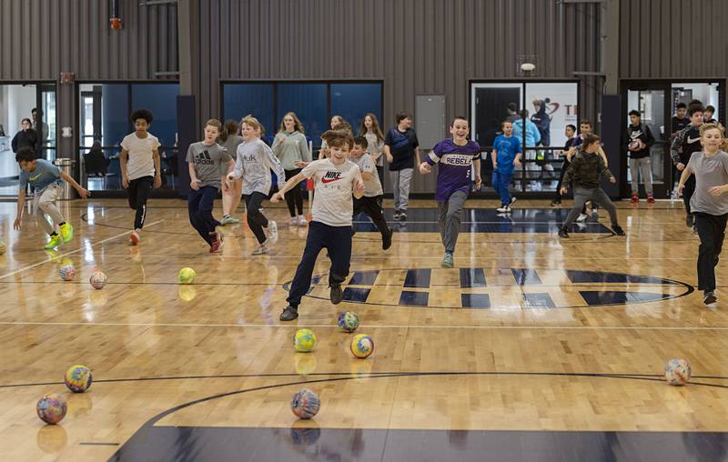 A game of Mushroom Ball kicks off at The Facility Wednesday, March 8, 2023 right after a quick lunch. Dixon schools had a half day of learning.