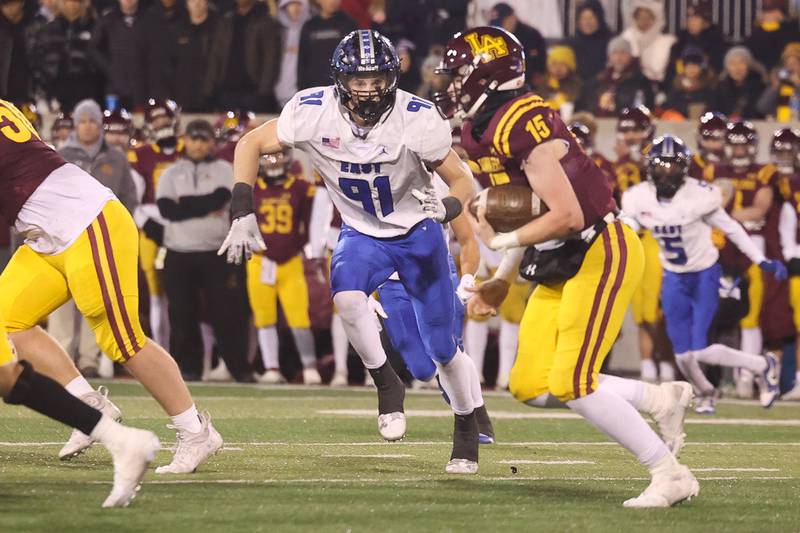 Lincoln-Way East’s Cade O’Rouke locks in on Loyola’s Ryan Fitgerald in the Class 8A championship on Saturday, Nov. 25, 2023 at Hancock Stadium in Normal.