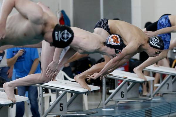 McHenry’s Robbie Rosenbaum swims to championship finals in 2 events