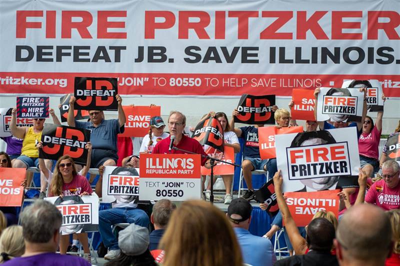 Illinois Republican Party Chairman Don Tracy speaks at a Republican Day rally at the Illinois State Fair, leading supporters in a "Fire Pritzker" chant referring to the 2022 Illinois governor's race.