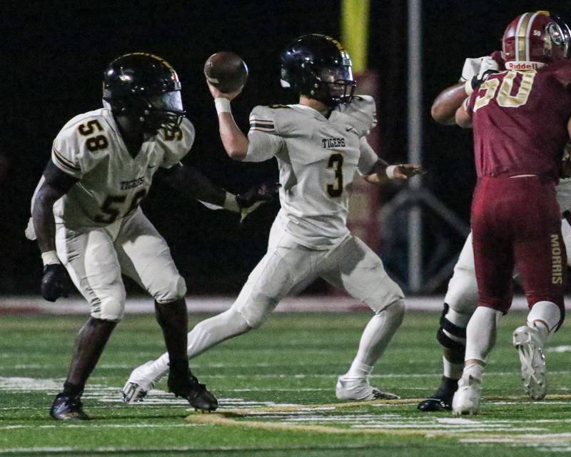 Morris Griffin Zweeres (7) runs after a catch during football game between Joliet West at Morris.  Sept 1, 2023.