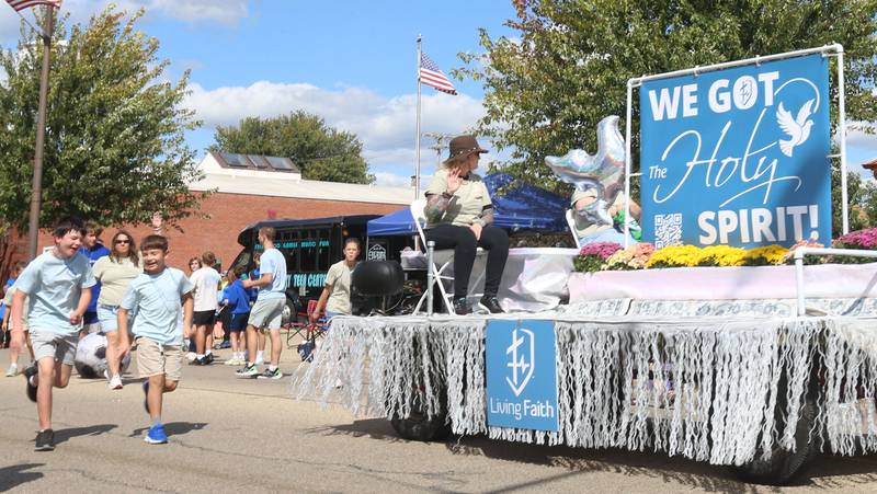 The Living Faith Church float rides during the 54th annual Homestead Festival parade on Saturday, Sept. 6, 2025 in Princeton.