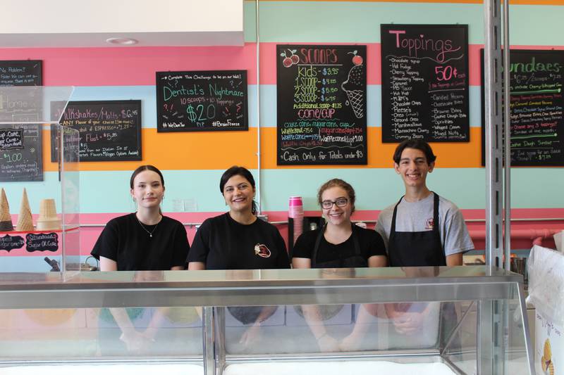 Cherry on Top Ice Cream Shoppe employees Payton Volkmar, owner Mariangela Bolognini, Paige Yarrington and GianCarlo Cannone start a shift at the Bartlett location June 1, 2023.