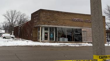 After roof collapse in Woodstock, it’s unclear when street will reopen, if building will remain standing