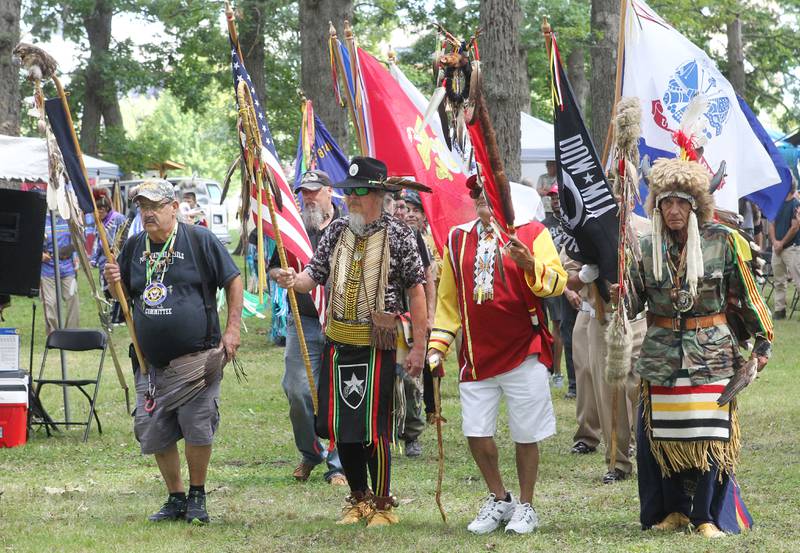 Native Americans who are also veterans walked together in the Grand Entry during the 30th Annual Potawatami Trails Pow-Wow at Shiloh Park on Saturday, August 26th in Zion. 
Photo by Candace H. Johnson for Shaw Local News Network