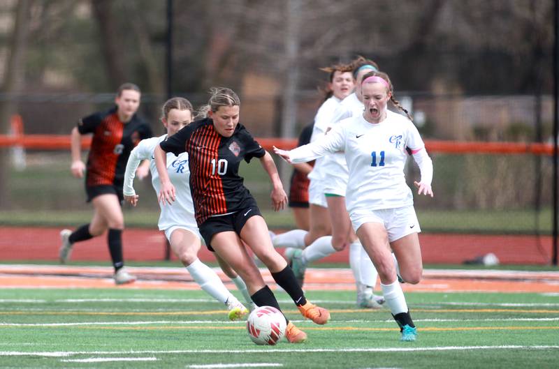 St. Charles East’s Qori Strotkamp dribbles the ball during a game on Tuesday, April 1, 2025 against Burlington Central in St. Charles.