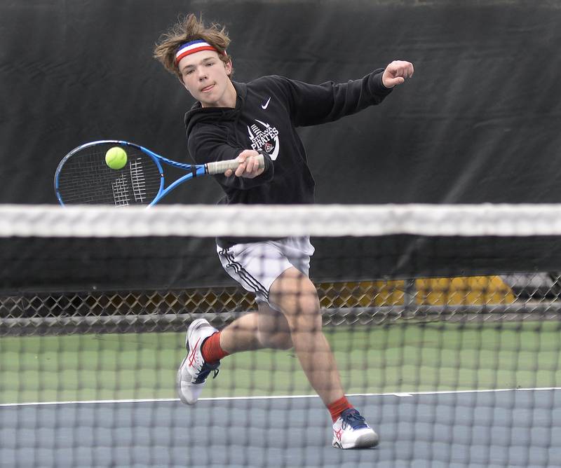 Ottawa singles player Trevor Mortenson strikes the ball Saturday, April 22, 2023, during the Ottawa Invitational at the Henderson-Guenther Courts.